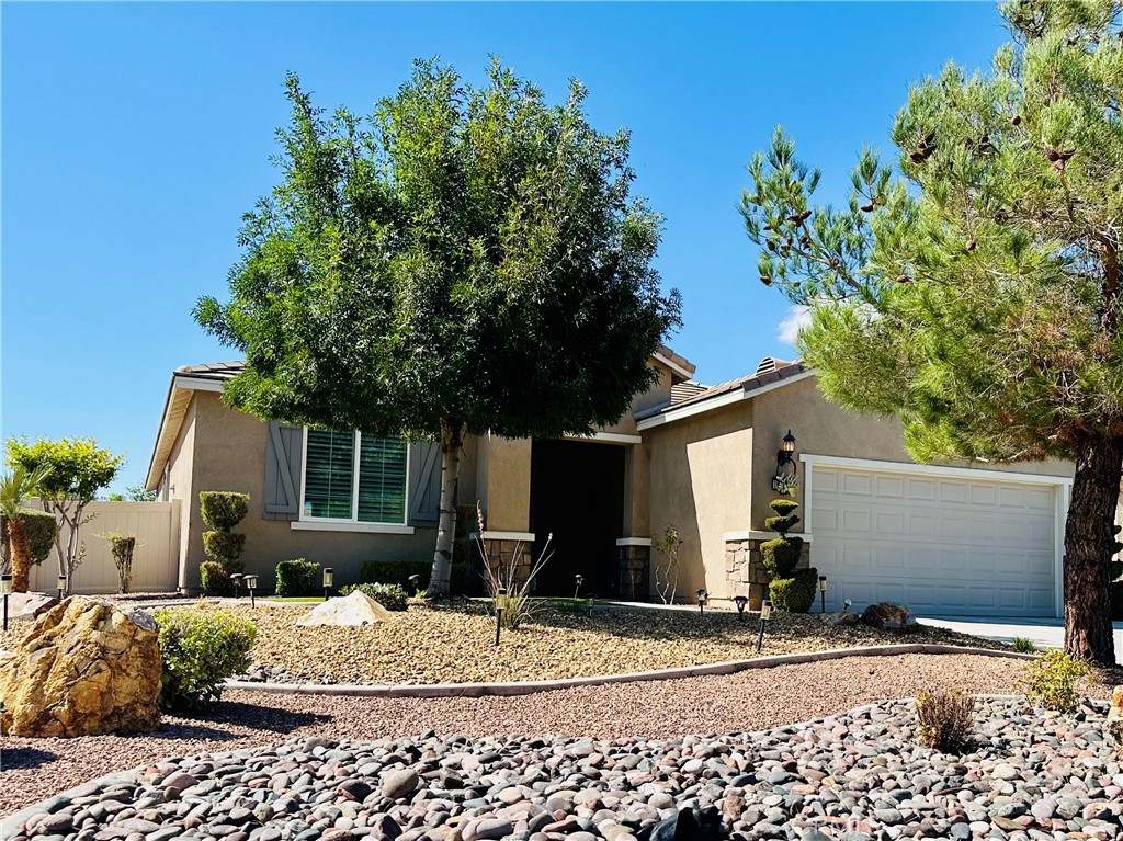 Beautiful One-story Corner home in the desirable Senior Community 55+ of SUN CITY, and Solera at Apple Valley. This is conveniently located adjacent to Ashwood Golf Course, close to Jess Ranch Shopping centers and entertainment venues. The Aspen Clubhouse and the Mariposa Lodge provide just about everything a resident could possibly be looking for. Gym with fitness classes, 2 Tennis Courts, 4 Pickleball Courts, and 4 pools. Clubhouse with Meeting rooms, Library, Ballroom, and Billiard room. This property features a Very clean and spacious, 2 bedrooms 2 bathrooms, Large Living Room, most windows through the house have built in Shatters. Office room that could be used as 3rd bedroom. Gorgeous Kitchen with breakfast bar and dining area. Laundry Room area and Garage space for two cars. This property has a beautiful and inviting backyard with area for family gatherings and/or barbeques. Master bedroom has a large walking closet. You MUST SEE IT to appreciate it!!!