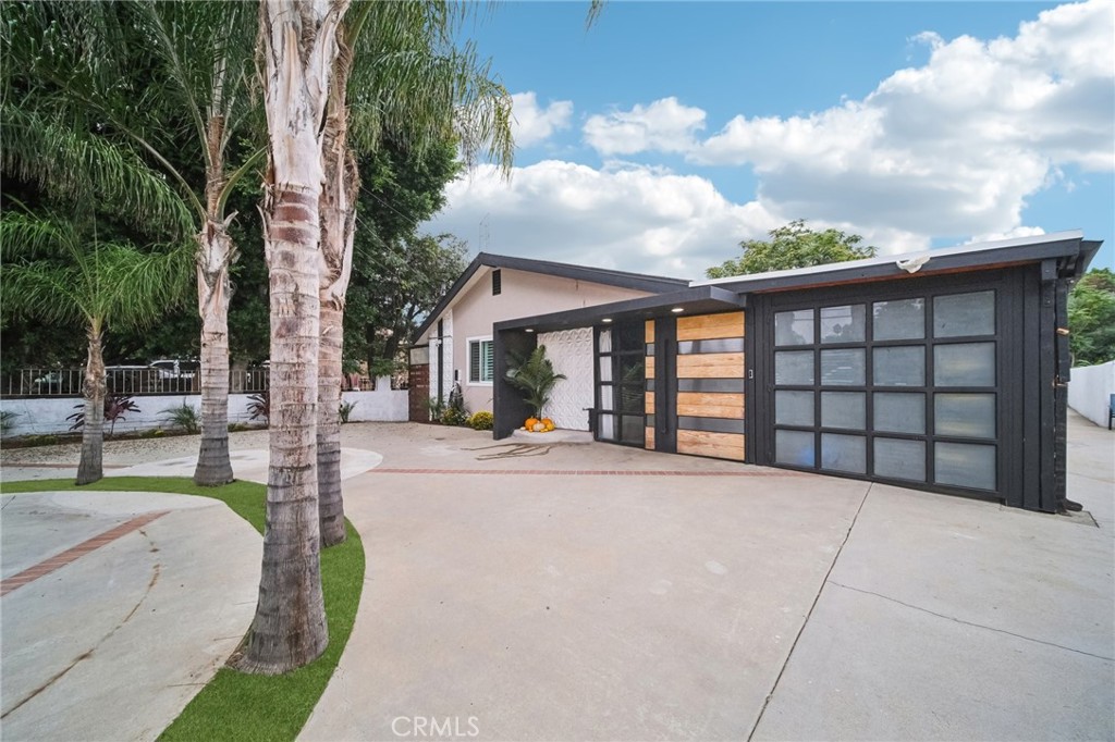 Step into this beautifully remodeled single level home nestled in the heart of Sylmar, offering the perfect blend of modern comfort and a great location. With 4 bedrooms, 3 full bathrooms, and 2,282 square feet of living space, this residence is ideal for families, entertaining, or creating private retreats.
Perched on an expansive 7,459 sq ft lot, this property captures both privacy and outdoor potential. Completely renovated and exquisitely finished, the home showcases a bright open floor plan that flows effortlessly from room to room. The chef’s kitchen is a standout: quartz countertops, abundant cabinetry, stainless steel appliances, and a stylish tile backsplash make it both beautiful and functional. Cozy up by the double sided fireplace, a unique architectural feature that enhances both living and dining areas.The master suite is a private haven, complete with a walk in closet, a private exit to the rear yard, and an en suite bathroom featuring a jetted tub, dual shower heads, and a spacious walk in tiled shower. Entertain with ease in the resort-style outdoor space, equipped with a covered cabana, built-in BBQ, and generous patio area for lounging or dining al fresco. Whether your priority is hosting, multigenerational living, or simply relaxing in style, 15752 Cobalt St delivers on all fronts. Let this be the backdrop for your next chapter.