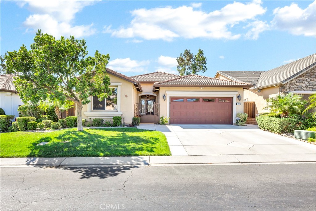 Welcome to a rare gem in the prestigious Four Seasons 55+ Active Community, where luxury and leisure blend seamlessly. Perfectly positioned with a sweeping view of the golf course and surrounding lake, as well as the 17th green, this residence offers both serenity and sophistication.
Step inside to soaring vaulted ceilings and a bright, open floor plan enhanced by recessed lighting throughout. The home boasts built-in cabinetry, crown molding, a tankless water heater, and a newly upgraded A/C system for modern comfort. The primary suite showcases updated hardwood flooring, while the kitchen features granite countertops—a refined touch for both everyday living and entertaining. There is even a 40 amp outlet in the garage for EV charging. All on a premiere lot!
Beyond the home, indulge in the unrivaled amenities of Four Seasons: a junior Olympic-sized swimming pool, pickleball and tennis courts, a state-of-the-art fitness center, library, on-site restaurant, and an elegant ballroom. This is more than a home—it’s a lifestyle designed for those who appreciate the very best.