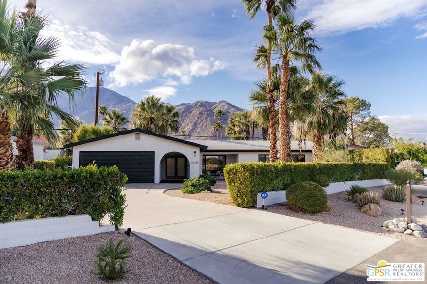 Fabulous, renovated view home in a coveted Palm Springs location available for lease! Newly remodeled, you will find a spacious, contemporary home with 3 bedrooms, 2 bathrooms and fantastic entertaining areas, both inside and out. Nearly new SOLAR panels will keep your energy bills low! Enter this lovely home into a foyer and find the first of multiple entertaining spaces in the open-concept great room. The great room has multiple, spacious areas for relaxing, eating and spending time enjoying the gorgeous, panoramic mountain views. Direct access to the pool, spa and covered patio is conveniently adjacent. The beautiful, fully equipped kitchen will satisfy any professional chef out there. Complete with high-end appliances, built in bar, large pantry and an expansive breakfast bar, the kitchen is great for entertaining! Adjacent is the dining area which also has views to the backyard. The dining and great rooms have direct access to the covered patio and expansive outdoor living spaces. On the other side of the home, the primary bedroom suite, offer privacy, is large and inviting, has direct access to the pool and also offers a separate yoga/relaxation room. The fully remodeled primary bath is luxurious and fully equipped. Adjacent to the primary, the other two bedrooms are comfortably spacious with great light. A remodeled second full bath compliments these rooms. Additionally, you will find a large, attached two car garage on this side of the home, complete with a Tesla charging station. The outdoor living spaces are not to be believed - a large pool and above-ground spa, fenced and landscaped yard, spacious covered patio, firepit, multiple sitting areas and unparalleled mountain and tree views complete the picture. This beautiful home is available completely furnished or unfurnished. Rare to find a home with this much attention to detail, not to mention including solar, that you can take advantage of! Offered turn-key furnished. Come see your next home! Pricing reflects annual lease - annual lease can be furnished or unfurnished. Please inquire for options on mid-term rental periods as well!