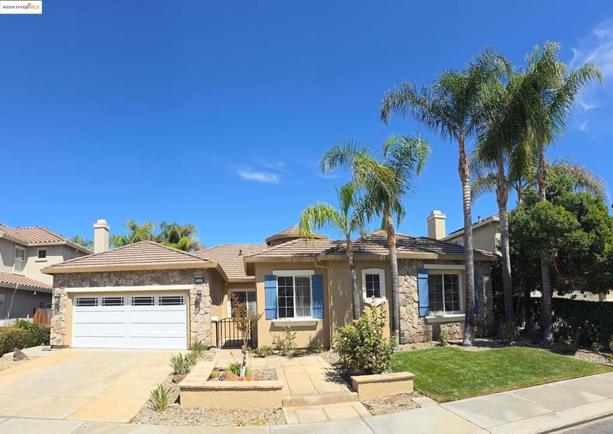 Welcome to this stunning single-story home in the gated Lakeshore community of Discovery Bay. With nearly 2,800 sq. ft. of living space, this home offers 3 bedrooms, an office, and a versatile bonus room. Fresh interior paint and brand-new carpet make it move-in ready. Step inside through the elegant circular foyer, which opens to the formal living and dining rooms, plus a bonus music room. The spacious family room features a cozy gas fireplace, while the large eat-in kitchen with an island and breakfast bar is perfect for gatherings and everyday living. The luxurious primary suite impresses with a coffered ceiling, gas fireplace, generous walk-in closet, and a spa-like bath featuring dual sinks, a jetted soaking tub, and a separate shower. Enjoy outdoor living in the beautifully landscaped backyard, complete with palm trees, a custom fountain with waterfall, extended deck, and cement patio—ideal for entertaining. Lakeshore offers resort-style amenities including 24-hour security, a pool, clubhouse, basketball and volleyball courts, walking trails, exercise stations, and BBQ areas. Timber Point Elementary is within walking distance, with nearby boat/jet ski launching, private country and yacht clubs, and waterfront dining just minutes away. All this and more—welcome home!