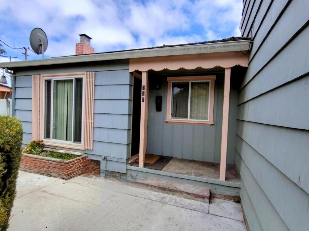 Welcome to this spacious and versatile four-bedroom, four-bathroom home, perfect for a multifamily living arrangement or those needing extra space. As you step through the front door, youre greeted by a converted living room/office area an ideal spot for a work-from-home setup or creative space. Each of the four generously-sized bedrooms offers comfort and privacy, with three of them featuring their own en-suite bathrooms. The large bedroom upstairs is especially spacious, providing even more room to stretch out. Beautiful hardwood floors flow throughout most of the home, adding warmth and character, while plenty of natural light pours in, creating a bright and inviting atmosphere throughout. The kitchen boasts custom wood cabinetry that ensures plenty of storage and organization. Theres no shortage of cabinet space in this home, making it perfect for a growing family or those who love to entertain. The exterior of the property is lined with mature landscaping, including several fruit trees, creating a serene and private outdoor retreat. Dont miss out on this exceptional opportunity! Schedule your private showing today and discover all that this home has to offer.
