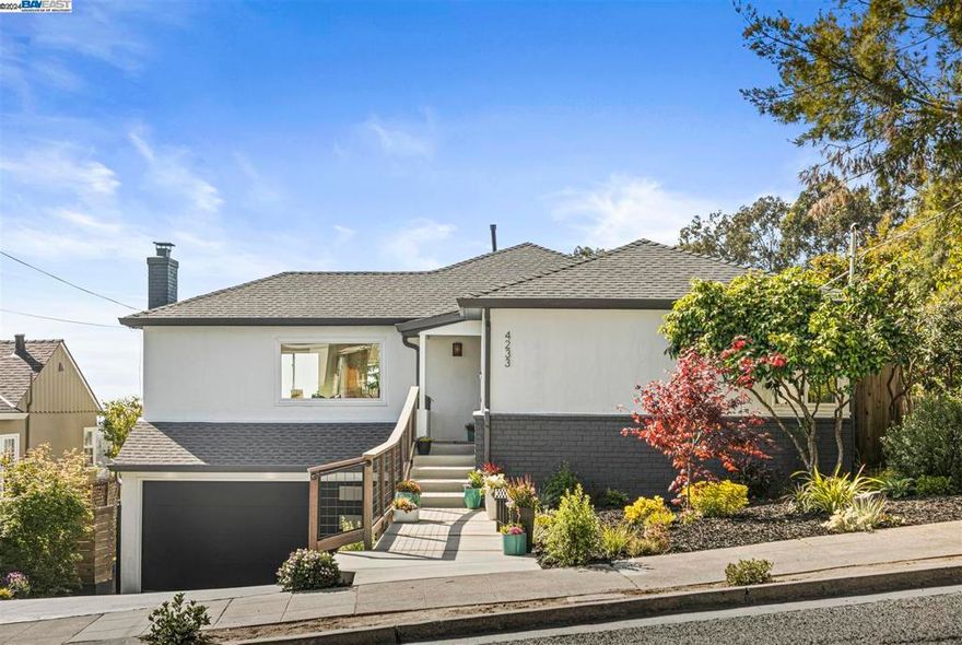 Discover a perfect blend of contemporary luxury and stylish living with this exceptional Lincoln Highlands residence. A large chef-inspired kitchen with gleaming quartz countertops, high-end appliances, and ample cabinetry, is perfect for all culinary enthusiasts. The serene primary bedroom has plenty of closet space and easily accommodates a California King bed. The ensuite bathroom features heated marble floors, double marble vanity, accent lighting, and a spa-worthy shower. Two additional bedrooms are located on the main level as well as another well-appointed bathroom with heated floors. The bright and inviting family room has another gorgeous bathroom, a convenient wet bar, and has direct access to the private lower patio. The cheery laundry room has natural light and abundant storage. An attached 2-car garage provides for even more storage and hobby space. The gracefully terraced rear garden provides for seamless indoor/outdoor enjoyment and entertaining. This home is all about contemporary design details and postcard views that are not to be missed. Welcome home to 4233 Wilshire Blvd.