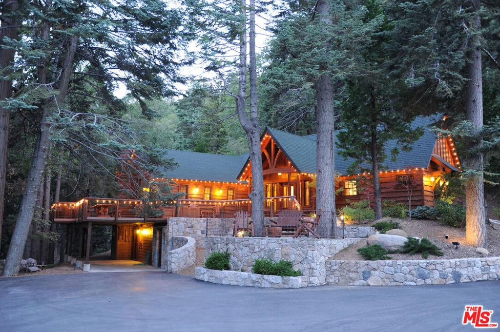 EVENT FACILITY NOW COMPLETED!! Endless possibilities as a family compound, corporate retreat, religious camp, or get creative with your own plan on this unique 37 acre property. Beautifully remodeled Ponderosa Lodge with 4 sleeping rooms accommodates up to 13 people, the Sugar Pine Cabin with original log structure sleeps 9, a 2 bedroom caretakers house, micro cabins and a newly constructed and nearly completed "barn" of 3200sf on each floor (40'x80') with potential for meeting/banquet hall, indoors sports court, car/boat storage, or other. This is a true getaway property just 90 minutes from LA/OC in very close proximity to The Village. Gorgeous lake views all over the expansive acreage. All utilities run through the property with significant opportunities to expand. There is also a 200 person amphitheatre overlooking the lake providing an unmatched atmosphere for ceremonies. There are 6 parcels with a mix of residential zoning and a commercial zoned property off State Hwy 173. Buyer to make its own determination if Zoning is appropriate for its intended Use or Improvement of properties. PROPERTY HAS LAKE RIGHTS!!