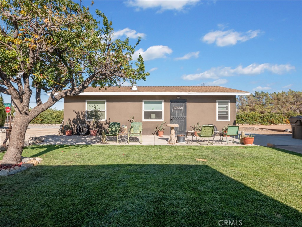 This is a Unique Property, located in an Excellent part of Hesperia. Close to Ranchero Rd with easy access to 15 Freeway. Short distance to schools, shopping, all businesses. Aquaduct next to property with lots of fishing. Large garage with full bath, carport, Sea Container for storage, shed. Yard Art that stays with the property is a Windmill and a Water Tank. Property is a must see to appreciate. Do not miss the opportunity to own a great property with lots of potential.