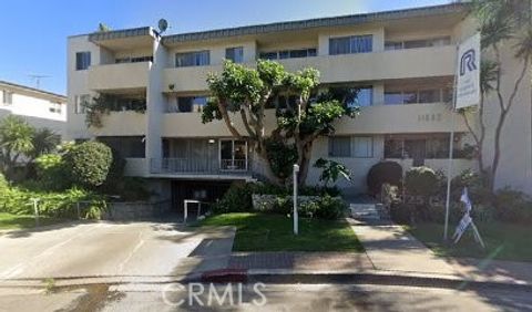 Photo of 11692 Chenault Street #303, Los Angeles, CA 90049 (MLS # DW26072553)