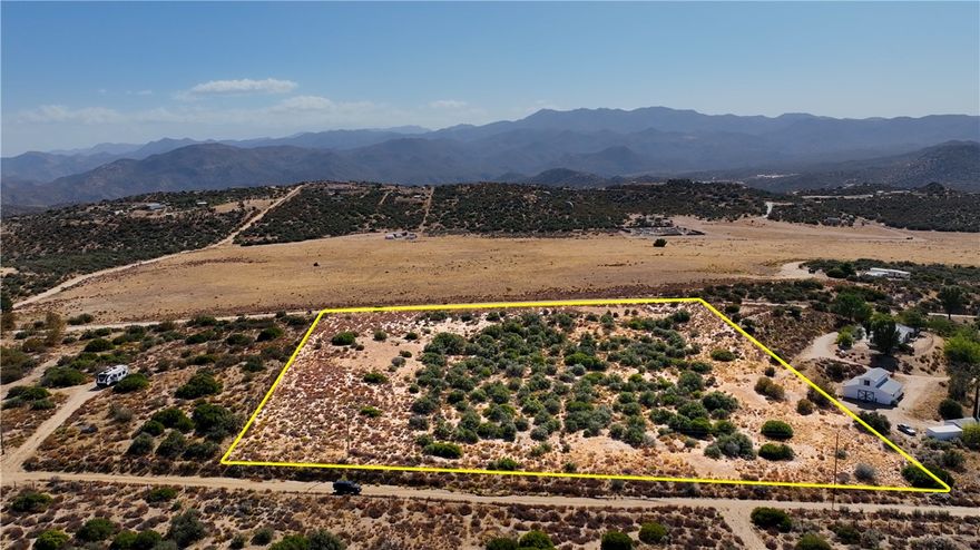4.39 Acres of usable land closed to paved road in Anza. This lot is very beautiful and usable terrain with great mountain and valley view and a short distance to paved Coyote Canyon Rd. Come build your dream home and ranch property. Anza is located at 4000 foot elevation with mild 4-season weather. 45 minute drive to Temecula or Palm Desert. Very close to Anza Borrego State Park. ***** Owner is willing to finance sale with 25% down on approved credit***** Also Bank Loans available with 15% down******