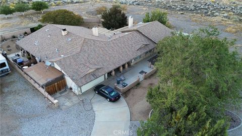 Photo of 7236 Coyote Trail, Oak Hills, CA 92344 (MLS # HD25146033)