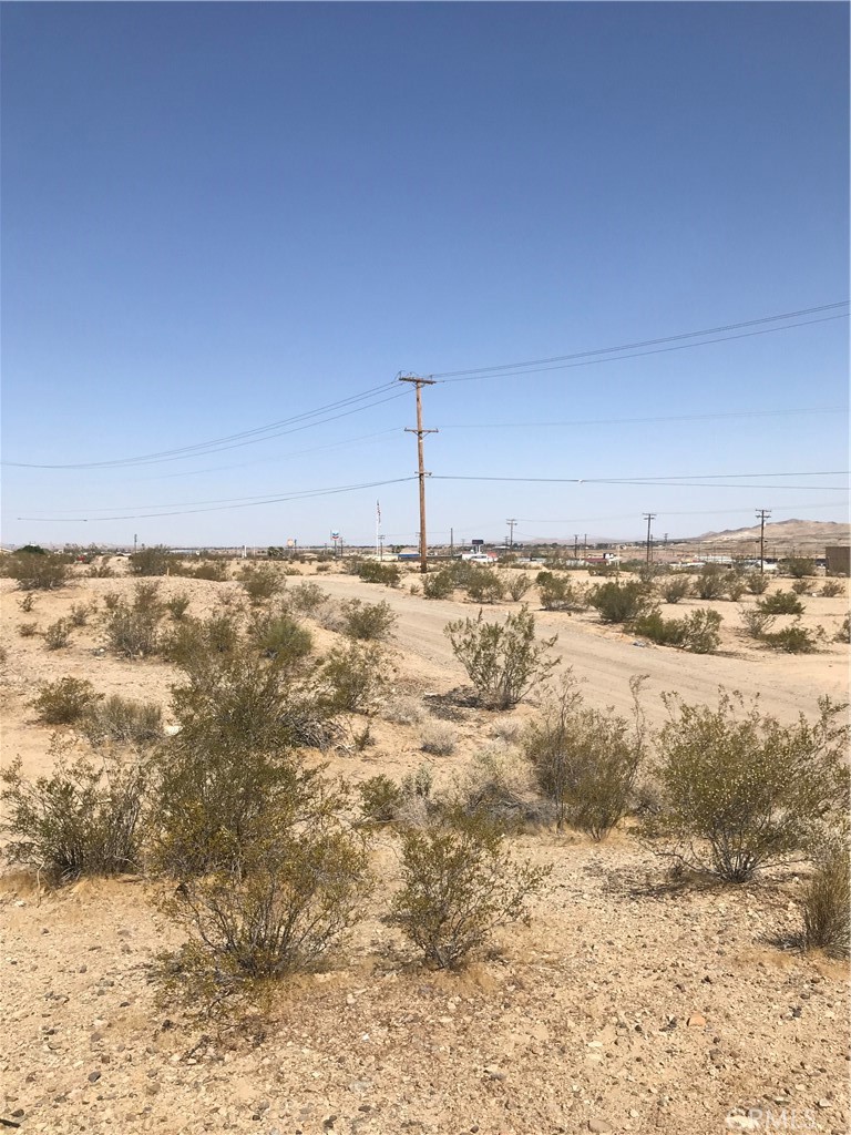 Over one acre of land in the Inland Empire region of California. (Barstow). The lot is close to the transportation area, community college, theater, cinemas, movies, and travel on a dirt road with few homes or to casinos, and retail. The parcel number is 0182-212-25-0000. The legal description is LOT 137 SEC 11 TP 9N R 2W EX N 50 FT E 75 FT THEREOF. Latitude and longitude coordinates are 34.890726,-117.050309.
