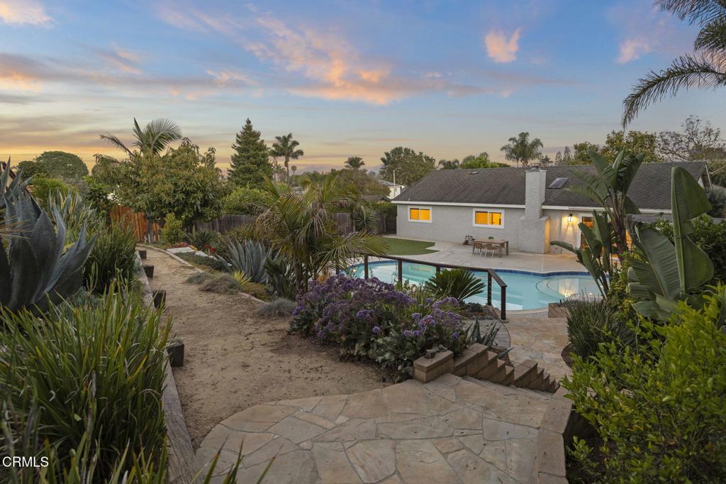 Welcome to this beautifully updated paradise pool home located in one of Ventura's most desirable neighborhoods above the college. From the moment you arrive, you'll be captivated by the resort-style backyard, featuring terraced landscaping, a sun lounging deck, and a sparkling pool--perfect for relaxing or entertaining.Inside, the home offers a flexible and functional layout. One private bedroom and bath are located in a separate wing, ideal for a mother-in-law suite, guest quarters, or a potential ADU lockout. The remaining three bedrooms are move-in ready with new carpet. Each bathroom has been tastefully remodeled, featuring modern tile work and sleek, clean finishes. A cozy den provides the perfect space for a home office, playroom, or creative studio.Major upgrades include owned solar, an updated central heating, a newer electrical panel, and a rebuilt chimney. The roof top deck offers the perfect viewing point for 4th of July fireworks. Don't miss this rare opportunity to own a versatile, well-maintained home in a sought-after Ventura location.