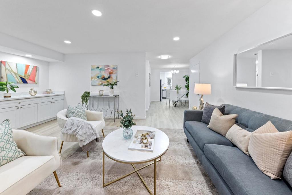 NEWLY RENOVATED. Nestled in the vibrant heart of Silicon Valley, this beautifully renovated condominium offers the perfect blend of convenience and modern comfort. Ideally located near top-tier amenities -- including shopping, dining, parks, and highly rated schools -- this home is also just minutes from Google's campuses, making it an exceptional choice for professionals seeking proximity to innovation hubs. Easy access to Highways 85, 237, and 101 ensures seamless Bay Area commuting. Step inside this corner unit and discover a stylishly updated interior featuring brand-new laminate flooring, recessed lighting, and a completely remodeled kitchen with sleek cabinetry, quartz countertops, and stainless steel appliances. The bathroom has also been upgraded with a new vanity and a contemporary LED-lit, anti-fog mirror for a touch of luxury. Unwind on your private deck, surrounded by mature trees and lush gardens, offering a serene retreat from the city's energy. The well-maintained community boasts ample parking, on-site laundry facilities, scenic walking paths, and a refreshing pool, providing a relaxed and convenient lifestyle. If you're seeking an updated, move-in-ready condo in a prime Mountain View location, this is the one! Don't miss the opportunity to make it yours.