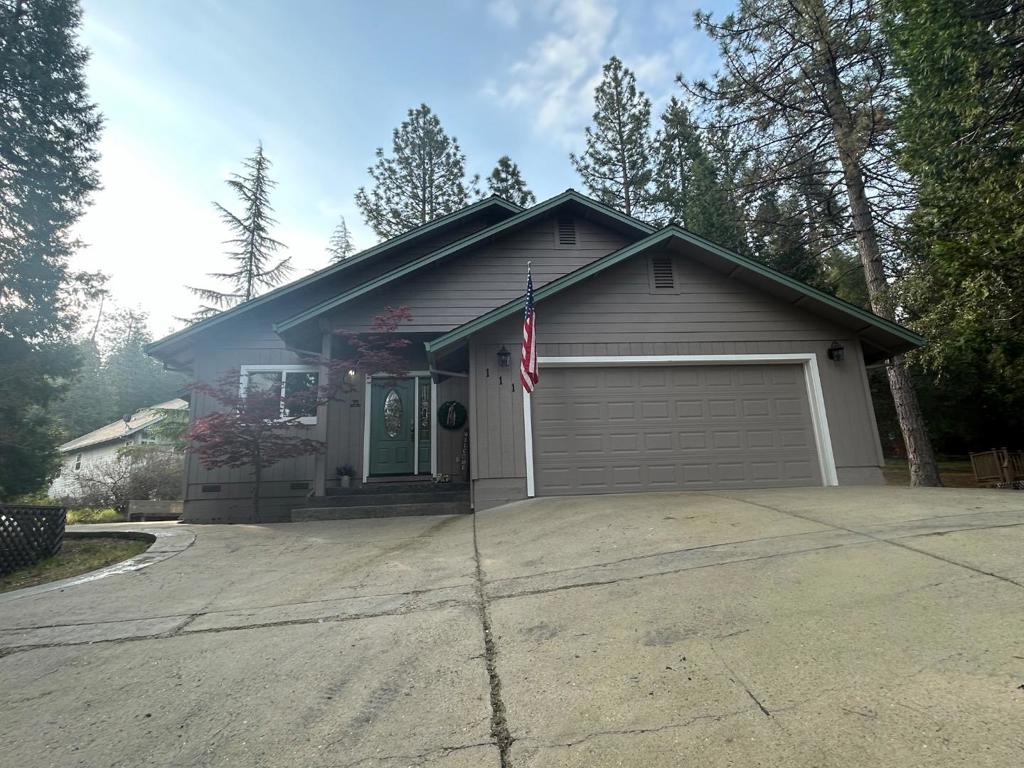 Beautifully update mountain home! Step inside this recently updated home with in a beautiful gated community offering security and stunning views. This home offers a large great room with dining and living area and new engineered hardwood flooring. The kitchen has been updated with custom finished granite counters and high end appliances. The primary bath has been updated to a walk in travertine shower with rain style shower head. The second bath offers a deep tub with a travertine shower surround. The 3 bedrooms are carpeted. A beautiful patio surrounded by forest views! Forest Meadows Owners Association offers 2 pools, a playground, club house, tennis/pickle ball courts, bbq area with picnic tables and miles of walking trails.