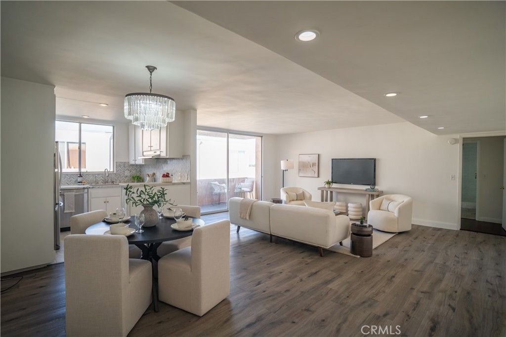 Photo of 5429 Newcastle #301, Encino, CA 91316 (MLS # SB25254643)