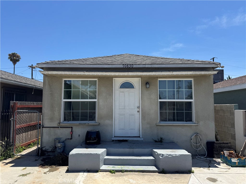 This wonderful 2 Bedroom 2 Bath home was fully renovated in 2018 with all-new dual-pane windows, flooring, and remodeled kitchen and baths. It features Central AC, a recently-installed Solar system (owned, not leased!), and space for 2 cars to park inside the secure front gate. The large backyard has direct alleyway access for additional parking or ample space to build an ADU. Nestled on a tranquil, low-traffic street, this home eagerly awaits its new owner.