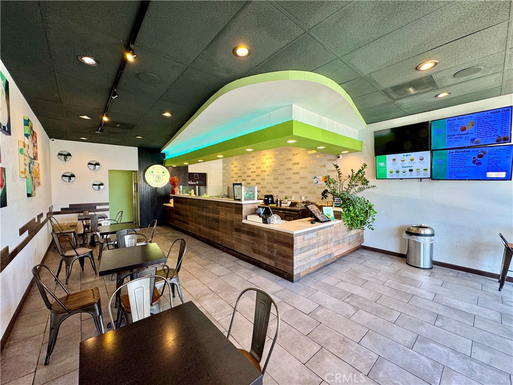 Modern, fully built-out boba and tea shop in a busy shopping center in Cypress. Built brand new in 2018, the space features a large kitchen, high ceilings, and quality finishes throughout—all in excellent condition. The shop comes with a long-term lease and low rent, making it ideal for a profitable business with room to grow. Located in a high-traffic retail plaza alongside Dollar Tree, Wienerschnitzel, Starbucks and other well-known brands, the shop benefits from excellent visibility and storefront parking. It’s conveniently situated near I-405 and CA-22, Target, Costco Wholesale close to airports, schools, and residential neighborhoods, bringing steady foot and vehicle traffic throughout the day.This is a turnkey operation, perfect for new entrepreneurs or experienced operators looking to expand into a high-demand market. The setup is also flexible for a variety of beverage or food concepts.