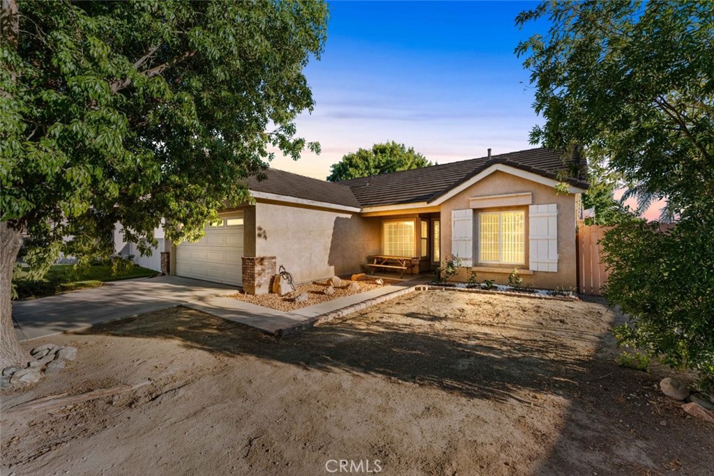 Welcome to this charming 3-bedroom, 2-bath single-family home offering 1,110 sq. ft. of comfortable living space on a spacious 6,969 sq. ft. lot. Nestled in a desirable cul-de-sac, this property combines convenience with privacy in a beautiful neighborhood setting.
Once inside you'll discover an inviting open floor plan with a cozy fireplace in the living area, accented by tile flooring, recessed lighting, ceiling fans, and fresh white paint that create a bright and airy atmosphere. The home features a designated dining area that flows seamlessly into the kitchen, which is equipped with stainless steel appliances, tile counters, and ample cabinetry, perfect for both everyday living and entertaining.
The well-sized bedrooms offer plenty of comfort and flexibility. Outside, the backyard provides endless possibilities with a wood-frame patio gazebo and space to redesign your dream patio or garden retreat.
With its prime location in a quiet cul-de-sac, thoughtful interior upgrades, and great outdoor potential, this home is ready to welcome its new owners.