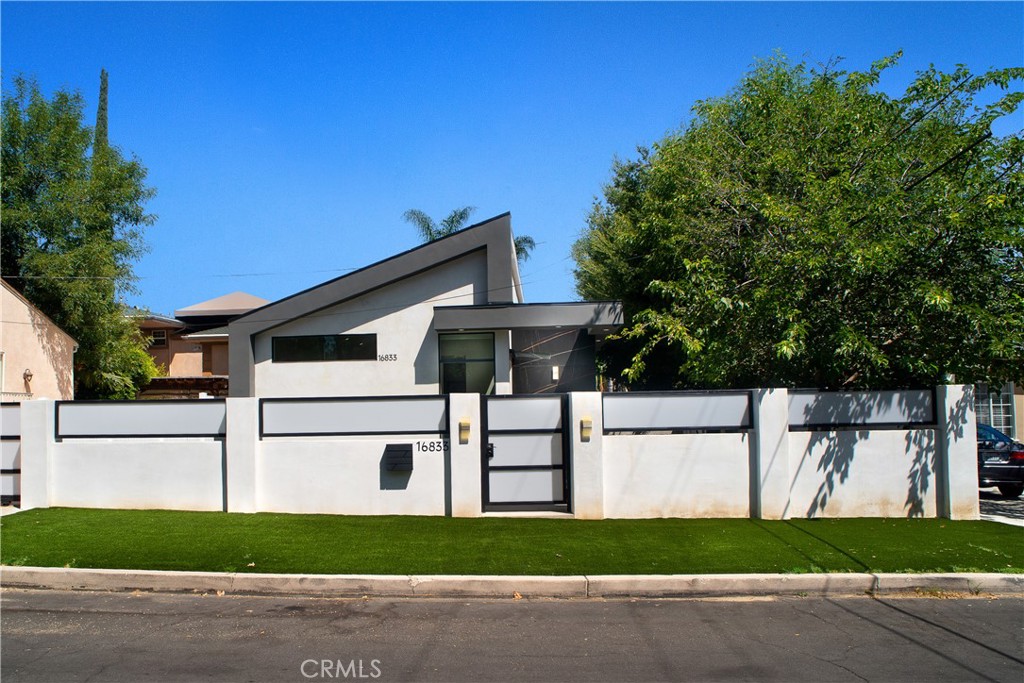 Welcome to this stunning newly constructed ADU, privately tucked behind secure gate and thoughtfully designed for both comfort and style. This 3-bedroom, 2-bathroom residence features an ideal open-concept floor plan with a seamless living and dining area that feels both inviting and spacious. The chef’s kitchen comes complete with brand-new appliances and an oversized island—perfect for everyday meals or hosting gatherings. The primary suite offers a serene retreat with its own private en-suite bath, while additional highlights include high ceilings, central A/C, motorized window shades, recessed lighting, solar panels, and the convenience of an in-unit washer and dryer. Step outside to your private yard, an ideal setting for relaxing or entertaining guests. Perfectly situated near the vibrant dining and shopping of Ventura Boulevard with easy freeway access, this move-in-ready home combines privacy, convenience, and modern living in one exceptional package. (Some images have been virtually staged for illustrative purposes only.)