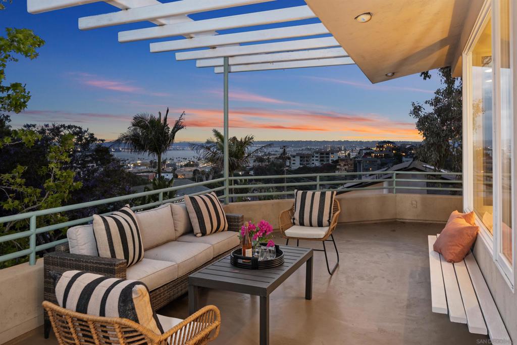 First time on the market this stunning contemporary was custom-designed by architect Jack Wagenaar as his personal residence. Located near Maple Canyon Trail, this 2,782 sqft home features 4 bedrooms (plus optional 5th), 3.5 baths, and spans three levels. Expansive wrap-around balconies on the top two floors offer ideal spaces to relax or entertain while taking in unobstructed views of San Diego Bay, Coronado, and Point Loma. Filled with natural light and timeless design elements, this is a rare opportunity... to own a one-of-a-kind architectural gem in the heart of San Diego.