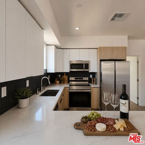 Photo of 10827 Peach Grove Street, North Hollywood, CA 91601 (MLS # 26837001)