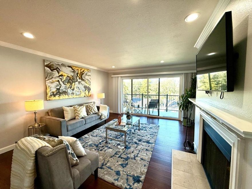 Discover comfort, style & convenience in this beautifully updated top floor 2 br,2 ba condo offering 1190 sqft of elegant living space. Perfectly situated in a highly desirable community, it combines modern upgrades w/ everyday functionality. Step inside to an inviting open floor plan featuring gleaming hardwd floors, recessed lights & abundant natural light streaming through large windows.The cheery living rm centers around a cozy fireplace,creating perfect space to relax or entertain. Enjoy the fresh air & panoramic views from your private balcony, ideal for morning coffee.The upgraded kitchen boasts quartz countertops,modern cabinetry & s/s appliances,offering style & efficiency. The primary suite features mirrored his & hers closets & serene views, while the 2nd bedroom has mirrored closet, dual vanities in the bath & a scenic outlook. Addl highlights include in-unit laundry, 2-deeded parking, private storage, elevator access & low HOA dues. Minutes to BART & Caltrain, w/ ez fwy 280 & 101 access, it offers an effortless commute to SF & Silicon Valley. You'll love being within walking distance to Bayhill Shopping, Youtube, Walmart corp ofc & nearby dining, park & mall.This top floor gem offers the best of contemporary living w/ a location that truly connects you to everything.