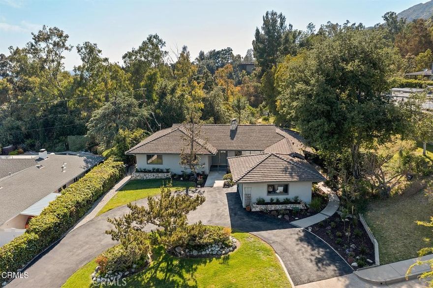 This single-level traditional home is perched among mature trees atop a private canyon bordering the city of Sierra Madre and Arcadia's desirable Highland Oaks area. This tranquil location provides dramatic views of the mountains and city lights. The backyard is a private retreat, often frequented by the abundant wildlife that calls the canyon home. The rear of the house has floor-to-ceiling windows that bathe the home with light and affords beautiful views of the expansive yard. There are a generous eat-in kitchen, spacious living room, and den. Additional features of this home include a two-car garage, hardwood floors throughout, new electrical panels, and recently updated central heating and air conditioning. Located just minutes from downtown Sierra Madre, hiking trails, Wilderness Park, and easy access to major freeways, this home offers the perfect combination of privacy and convenience. Owner added an ADU in the back with one bedroom, one bathroom, 1,200sqft. This lot also connected with private 100 acres of land in the back yard, you can access anytime! Wild animals and nature stream. Calling all nature lovers!
