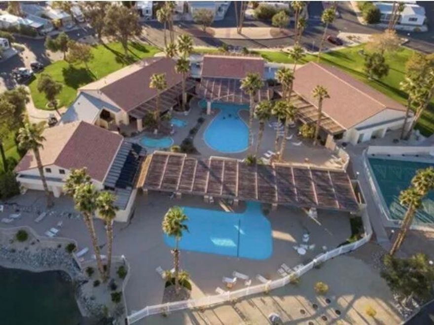 New upgraded plumbing and LVP wide plank flooring!Nice wrap around deck and giant fenced yard with desert views!Sky Valley Resort is an ALL AGED family park popular with full time residents and vacation homes.  The resort features:13 sparkling hot spring mineral pools;pickleball, tennis, shuffleboard, horseshoes, gym, fitness center, walking trails;cafe and chef;peak season activities, classes, community events and MORE!