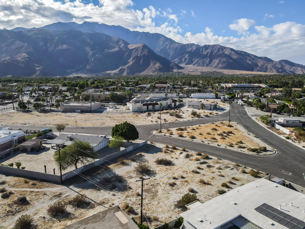 CITY-APPROVED PLANS ALREADY IN PLACE! An incredible opportunity awaits you to create your dream compound on this prime vacant lot. The plans include a spacious single-family home with a 3-car garage and a detached ADU (Accessory Dwelling Unit) featuring its own one-car garage--perfect for extended family, guests, or rental income. The lot boasts stunning views of the majestic San Jacinto Mountain range and is nestled in an established neighborhood that offers a sense of community and charm. Utilities, including power, water, gas, and sewer, are conveniently available on the street (buyer to verify utility access). Don't miss your chance to bring this unique vision to life!
