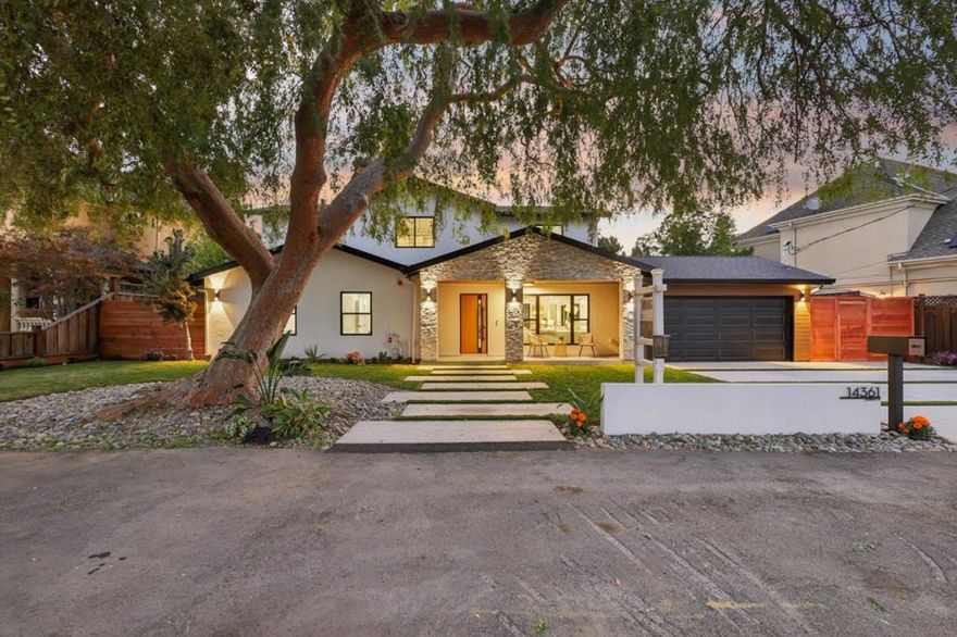 East-facing and newly expanded, this stunning 5-bed, 4-bath home lives like a brand-new build with 3,169 SqFt plus a permitted 742 SqFt workshop, totaling 3,911 SqFt on a 10,998 SqFt lot. Soaring vaulted ceilings, skylights, recessed lighting, and wide-plank 5/8" x 10.25" engineered wood floors create a bright, airy, and inviting feel throughout. Charge any EV with the Tesla Universal Charger. Main level features open-concept living with fireplace, dining, chefs kitchen with pantry, extra storage, custom cabinetry, statement lighting, sleek porcelain counters, and high-end Miele appliances. 3 bedrooms and 2 baths include a private en suite with vaulted ceiling, spa bath, smart toilet, and direct yard access. Upstairs has two en suites, including a luxe primary retreat with custom walk-in closet, built-ins, oversized spa bath with soaking tub, dual vanity, and walk-in shower. Outdoors offers lush lawn, large paver patio, mature landscaping, pickleball court, and versatile workshop with built-ins and TV for entertaining. RV/boat parking, 2-car garage, and ample driveway. Excellent schools: Sartorette Charter, Price Charter, Leigh High, plus Harker & Challenger. Rare chance to own a like-new home blending modern design, thoughtful upgrades, and versatile spaces in prime Cambrian!