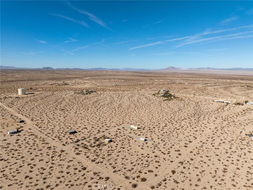 Nestled in the serene landscape of 29 Palms, this fixer-upper offers an exceptional opportunity to craft your dream oasis. With its generous 5-acre lot, this property is a canvas waiting for your artistic touch. Whether you're looking for a personal retreat or an investment with great Airbnb potential, this unique offering provides ample possibilities.

Features and Highlights

1 Bedroom Home: A cozy abode that serves as the perfect starting point for your renovation journey. With a little TLC, this home can be transformed into a charming desert getaway.

5th Wheel on Property: An added bonus for those seeking additional space or accommodation options. This versatile feature can serve as temporary housing during renovations or as an extra guest area.

53 Foot Refrigerated Container: Conveying with the property, this refrigerated container is ideal for storage or creative repurposing. Imagine the potential for a unique outdoor lounge or a secure workshop.

Expansive 5 Acres: Embrace the freedom to expand, garden, or explore. This ample acreage grants you the liberty to cultivate your vision, whether it's for personal enjoyment or hosting visitors.

Investment Potential

This property is ripe with opportunity for those with a vision. Its proximity to Joshua Tree National Park and other local attractions makes it an attractive location for short-term rentals. With some renovation and creativity, this fixer-upper could become a sought-after Airbnb destination, offering guests a unique desert experience.

Unlock the potential of this 29 Palms property and create a slice of paradise that reflects your style and aspirations. Don't miss the chance to turn this fixer-upper into a flourishing investment or a personal haven.