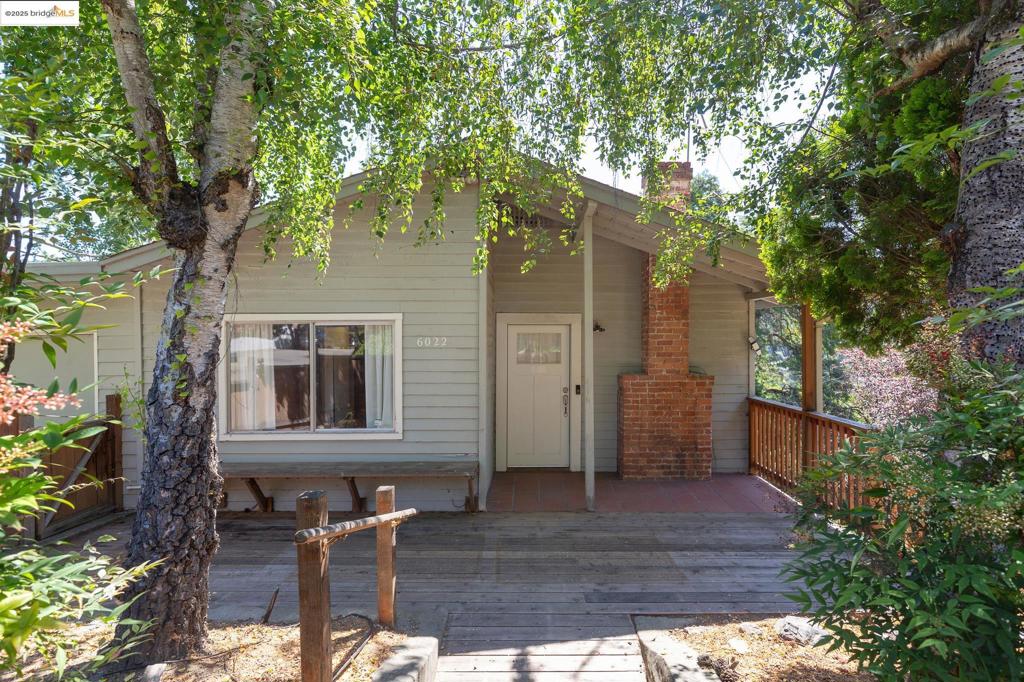 Level in FIXER! Ranch with mid mod vibes seeking vision and rehab. Has a peek of a view and a huge lot. Your opportunity to bring vision to this sweet and cozy spot. Updated with heat pump. Use interior or exterior driveway side stairs only!