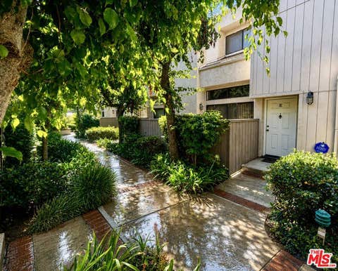 Photo of 15173 Magnolia Boulevard #E, Los Angeles, CA 91403 (MLS # 26864643)