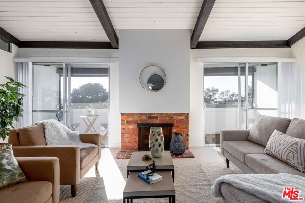Photo of 6425 Green Valley Circle #300, Culver City, CA 90230 (MLS # 26857425)