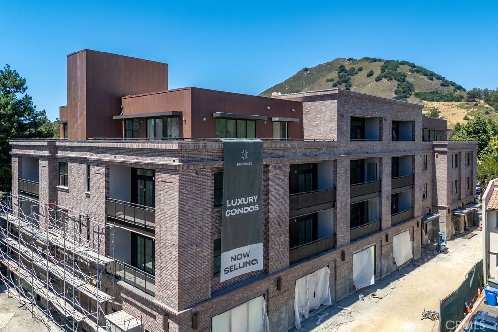 Welcome to Brickhouse at San Luis Square - centrally located in the heart of Downtown San Luis Obispo just steps from restaurants, shops, cafes, weekly farmers market, and more. Brickhouse is a 29 unit luxury condominium community currently under construction, with homes expected to be ready for closing this Summer 2025. Offering single-level living with a refined blend of luxury, comfort, and modern convenience, Brickhouse features a variety of thoughtfully designed floor plans—from open concept and flex 1 bedroom layouts to two-bedroom homes and penthouse suites—each enhanced by never-before-seen views of Cerro San Luis, Terrace Hill, and the downtown cityscape. Extra care was taken by the builder to maximize natural light and ensure superior soundproofing between units and from exterior noise, creating a peaceful urban retreat. Interior finishes include premium luxury vinyl plank flooring, solid-core cabinets with soft-close hinges, Silestone Quartz countertops, GE Café appliances, and elegantly tiled showers. Every home is tech-ready with double-pane windows, walk-in closets, and pre-wiring for data. Select units offer wraparound balconies for expanded indoor-outdoor living. An elevator provides easy access to all levels, and secure on-site underground parking is included. Brickhouse offers a rare opportunity for walkable downtown living with modern luxury in one of the Central Coast’s most desirable locations. For more information, visit us online or stop by the sales office at 599 Higuera Street, Suite A, open Thursday through Sunday from 12 to 4 PM or by appointment.