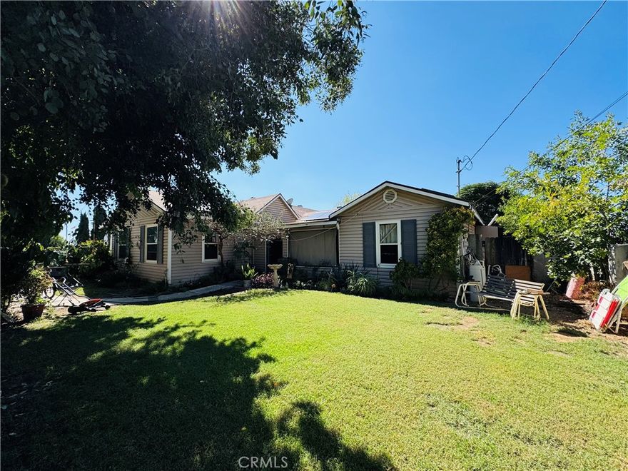 Spacious Yucaipa home with incredible potential! The main residence offers 3 bedrooms and 2 bathrooms, including a large primary suite with oversized bath and walk-in closet. Features include hardwood flooring, updated windows, oak kitchen cabinetry, HVAC, and solar to help reduce utility costs. In addition, there is a detached rear structure of approximately 1,000 sq. ft. with 1 bedroom and 1 bathroom (separate from the house sqft). Buyer to verify permits and requirements with the city, as corrections are needed per code. The property is zoned RM-72C, allowing for up to 4 dwellings—ideal for future development or investment opportunities. Other highlights include a detached garage and spacious driveway with additional parking. While the property does need some TLC, it offers endless possibilities for a homeowner, investor, or builder.