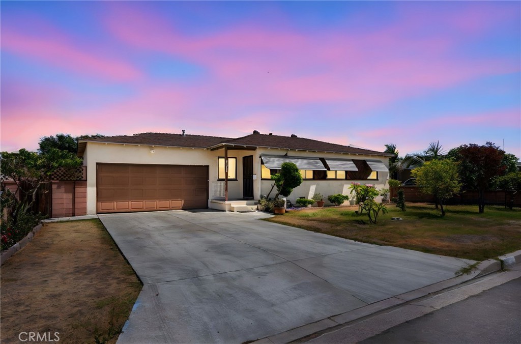Your Dream Home Awaits Just Minutes from the Magic
Picture this: You’re sipping your morning coffee surrounded by the sweet fragrance of citrus blossoms in your own backyard, knowing that the happiest place on earth is just a quick 15-minute drive away. This isn’t just a house, it’s your gateway to the perfect California lifestyle.
A Home That Welcomes You In
This delightful 3-bedroom, 1-bath home greets you with sun-drenched rooms that practically glow with possibility. The moment you walk through the front door, you’ll feel the warmth and character that makes this place special. Each room is a blank canvas waiting for your family’s story to unfold, with generous spaces that invite you to make them completely your own.
Your Personal Garden Paradise
But here’s where this home truly shines, step out back and prepare to be amazed. This isn’t just a backyard; it’s your own slice of garden heaven. Mature fruit trees dot the landscape like nature’s own grocery store, offering seasonal bounty that will have your neighbors green with envy. The established vegetable gardens mean you’ll be harvesting fresh tomatoes, herbs, and seasonal produce practically from day one.
Even with all this natural abundance, there’s still room to breathe. Wide open spaces beckon for weekend barbecues, children’s laughter, or that pool you’ve been dreaming about. This is outdoor living at its finest, where every season brings new delights and every sunset feels like a vacation.
Location That Can’t Be Beat
When you’re ready to venture beyond your private retreat, everything you need is at your fingertips. World-class shopping and diverse dining options are moments away, while major freeways connect you effortlessly to the broader Southern California experience. And yes, those spontaneous trips to Disneyland? They’re now part of your everyday life, not just special occasions.
This Is Your Moment
Properties like this, where character meets convenience, where tranquility meets excitement, don’t come along every day. This is your chance to own something truly special, a home where memories are waiting to be made and dreams are ready to take root.
Come see why this charming gem is calling your name. Your new life in paradise is just one decision away.