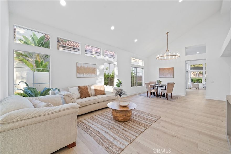 Here is your opportunity to own, enjoy one of the most desirable areas of Mission Viejo. Completely renovated with the latest in designer finishes, this home is sure to impress even the most discerning buyers. The finest attention to detail was given from the upgraded kitchen cabinetry to the stainless appliances. This open concept is perfect for entertaining or a quiet dinned for two. The recessed lighting, custom fixtures, new flooring, there was nothing  missed. Simply move in and enjoy! The custom tile work, new vanities in the bathrooms will leave you feeling relaxed and refreshed. The back yard is perfect for a summer evening of entertaining. Call today for your private showing.