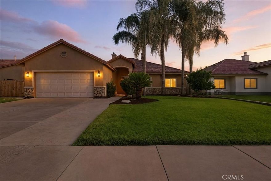 This home blends character, comfort, and style in one thoughtful design. Natural hardwood floors flow throughout the living spaces, while vaulted ceilings and a fireplace create a warm focal point in the living room. The kitchen has been updated with modern countertops, cabinetry, and stainless steel appliances, combining everyday function with timeless appeal.



The split floor plan offers privacy for the primary suite, complete with built-ins, while French doors open to a versatile bonus room that could serve as an office, retreat, or fifth bedroom. Three additional bedrooms and a full bath line the hallway, each spacious and inviting. Designer paint and a curated mix of modern and antique touches add depth and charm to every room.



Outside, a large covered patio overlooks the gated (removable) lap pool and a lush grassy area, creating a private retreat for both relaxation and entertaining. The home also features solar for energy savings, along with an assumable VA loan at approximately 3.5% interest and a monthly payment around $1,900 (including taxes and insurance)—a rare opportunity in today’s market. In a desirable Northwest Hanford neighborhood, it balances tranquility with easy access to shopping, dining, and just a short drive to NAS Lemoore