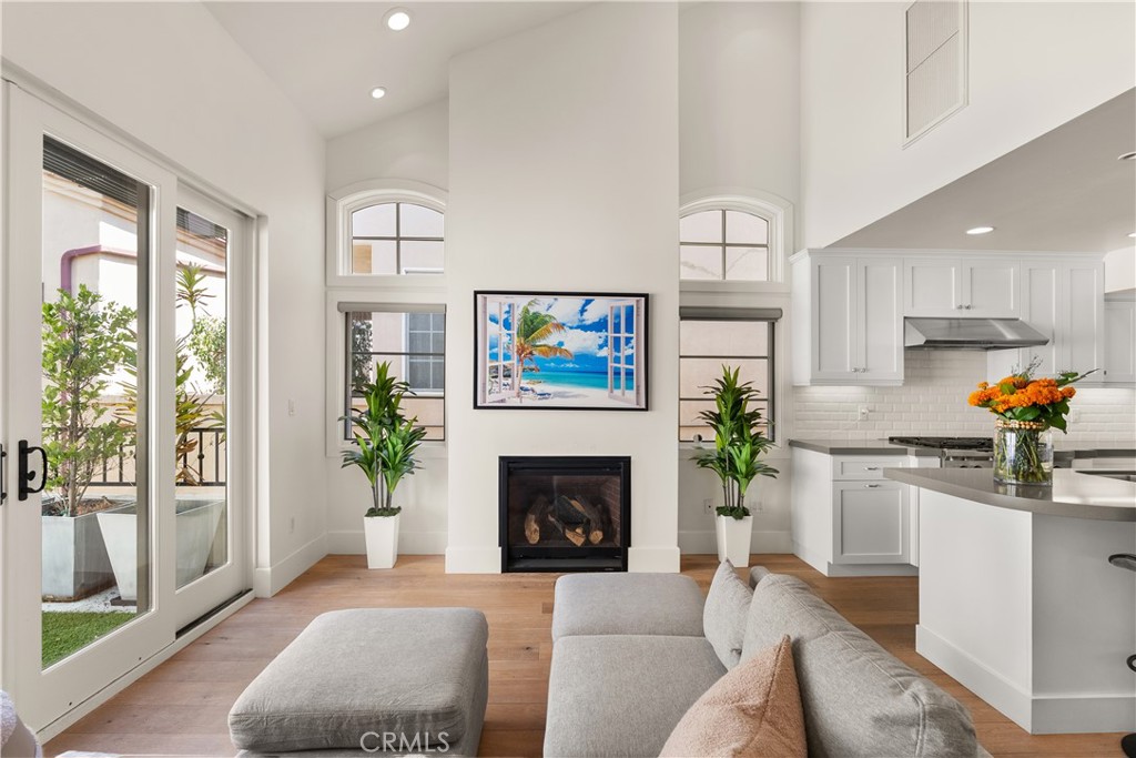 Fully furnished back unit located in the heart of Corona del Mar’s coveted Flower Streets, just moments from the beach, top-rated restaurants, and charming local shops. This three-level, 2 bed, 2.5 bath home features a ground floor with stackable washer and dryer, direct garage access, and an additional carport space. The second level offers a modern kitchen with wine fridge, a sunlit living area that opens to a spacious patio, and the primary bedroom with en-suite bath and private balcony. Upstairs, a second en-suite bedroom opens to a rooftop deck with dual lounge areas, perfect for enjoying ocean breezes and sunset views—all in a location that puts the best of CDM at your doorstep.