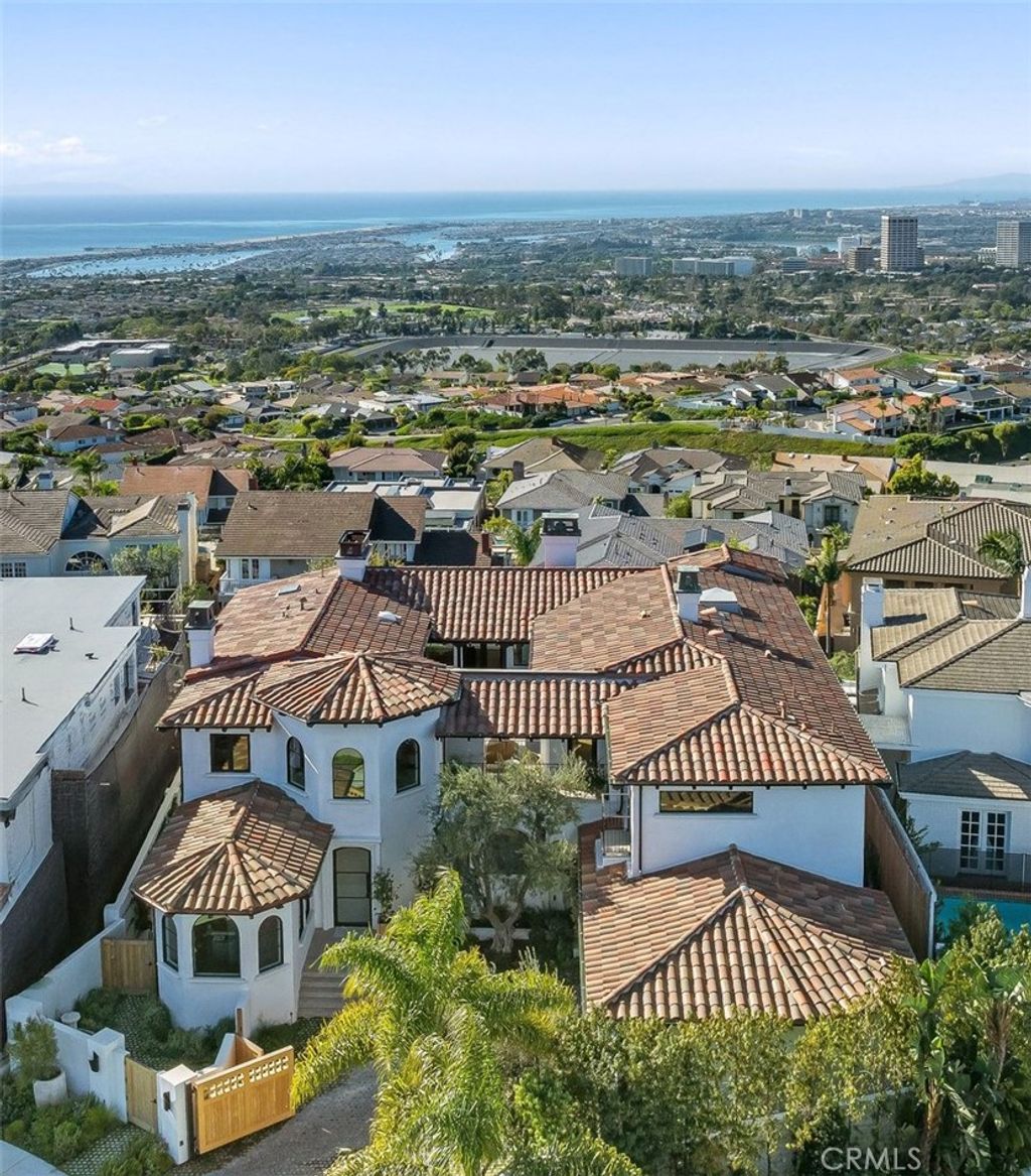Photo of 17 Muir Beach Cir, Newport Beach, CA 92625 (MLS # OC26034024)