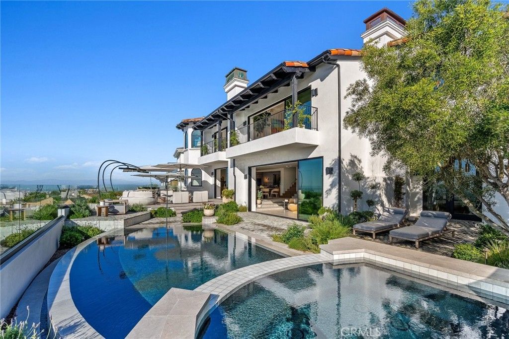 Photo of 17 Muir Beach Cir, Newport Beach, CA 92625 (MLS # OC26034024)