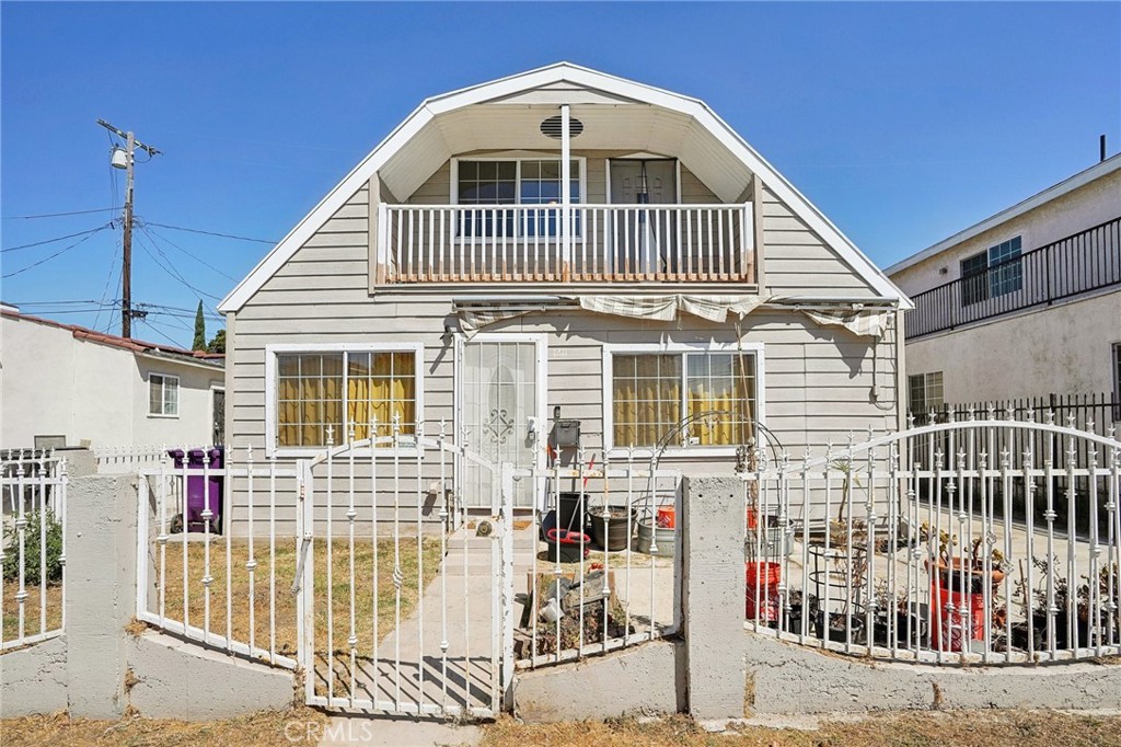 This charming 3-bedroom, 2-bath single-family home offers a unique blend of comfort and versatility! The first floor (approximately 1,056 sq. ft.) features 2 bedrooms, 2 baths, an open kitchen with dining and living areas, plus convenient laundry hook-ups. Upstairs, a spacious addition provides a third bedroom, a large open living space, and three balconies—perfect for enjoying fresh air and natural light. While the second-floor addition was completed by a previous owner in the late 90s/early 2000s, it appears to have been professionally done by a contractor. The square footage is based on the prior owner’s estimate and would be reflected in public records once permitted.
For year-round comfort, the home is equipped with four mini-split A/C units—one large unit upstairs and three downstairs—to keep the entire home cool during the summer. Parking is also a breeze with a long one-car garage and a driveway that can accommodate up to two additional vehicles, a rare find in Long Beach!
Don’t miss the opportunity to see this home—it won’t last long!