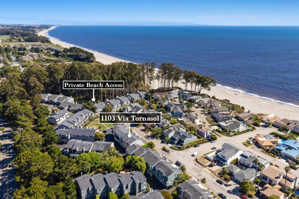 Dreaming of being just steps to the sand? Love a quiet community of beach goers? How about long walks on the beach where you can walk miles and miles with your dog? This could be just the place for you with Seascape golf course on one side and the big blue ocean on the other. This spacious 1,842 sq ft home offers three bedrooms, including a primary suite retreat, and two full bathrooms, pluse a half bath downstairs. 2 living areas creates so much separation of space it truly lives large. The gorgeous remodeled kitchen has brand new high end appliances making meal prep both stylish and convenient. Throughout the house top of the line hardwood flooring adds elegance, and the vaulted and high ceilings, complemented by skylights, enhance the open and airy atmosphere. For cozy evenings, the property features a fireplace in the living room and in the primary bedroom. Don't miss this one!