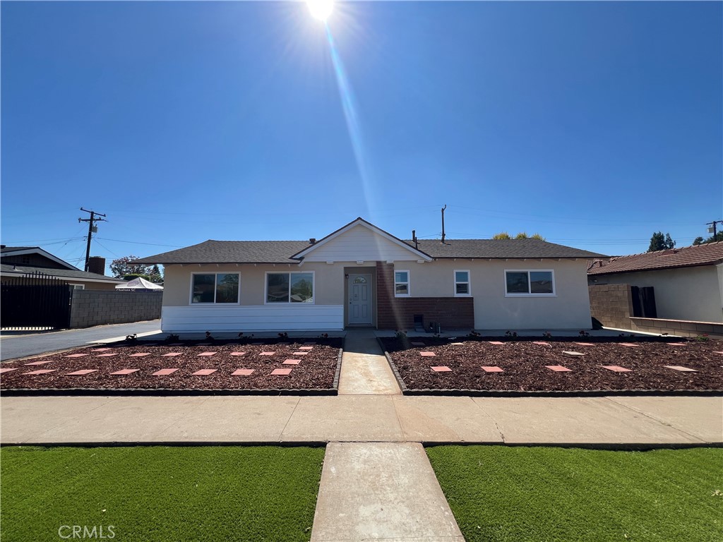 Welcome to 5261 Raintree Street, a beautifully renovated single-level home located in a quiet and family-friendly neighborhood of Yorba Linda. This move-in ready residence offers 3 spacious bedrooms and 2 modern bathrooms, all recently upgraded with stylish finishes and new designer flooring throughout. The bright, open-concept layout features a completely remodeled kitchen with brand-new countertops, cabinetry, and a breakfast bar that flows seamlessly into the dining and living areas—complete with a cozy fireplace. The home sits on a generous 7,200 sq ft lot with a large private backyard, perfect for outdoor entertaining or relaxing. Additional features include central heating, an attached 2-car garage with laundry, and a long driveway for extra parking. Conveniently located near award-winning schools in the Placentia-Yorba Linda Unified School District and close to parks, shopping, and dining. This fully upgraded home is now available for lease—don't miss the opportunity to enjoy comfort, style, and convenience in one of Yorba Linda's most desirable communities.