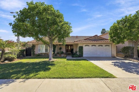 Photo of 21404 Germain Street, Chatsworth, CA 91311 (MLS # 26999183)