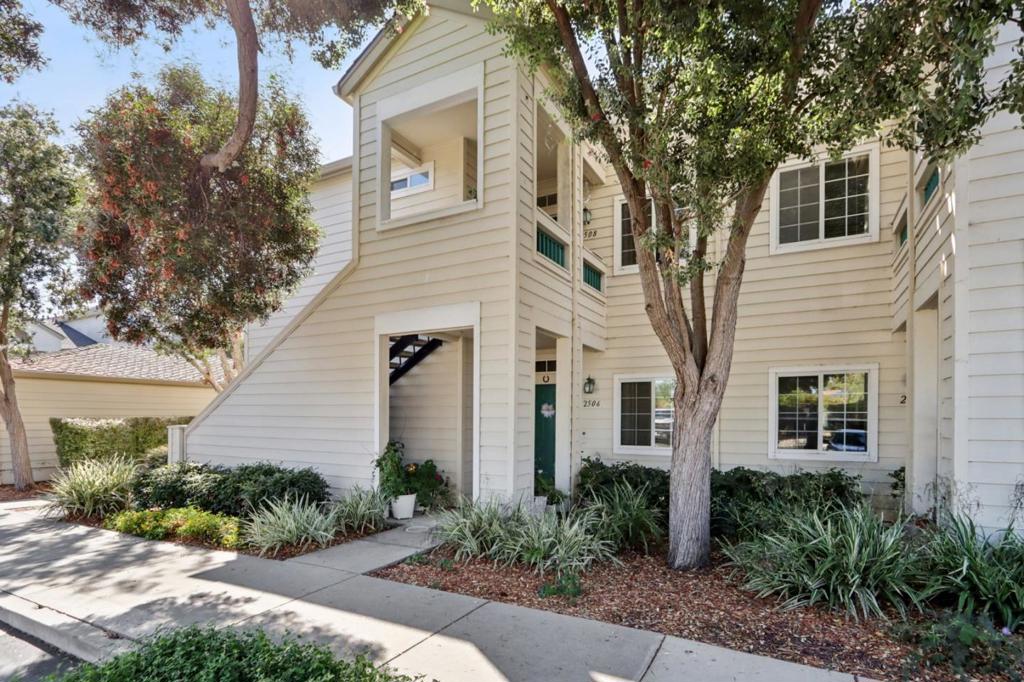 Welcome to this bright and spacious 2-bedroom, 2-bath condo located in beautiful Redwood Shores. A highly desirable top-floor end unit with soaring ceilings in the living room creates an airy open atmosphere. The open-concept layout features a comfortable living area, defined dining space, and a modern kitchen perfect for both entertaining and everyday living. Step out onto your private, spacious balcony ideal for morning coffee or unwinding at sunset. Both bedrooms are generously sized, with the primary bedroom also having access to the balcony. New carpet and paint throughout. The unit also includes in-home laundry and air conditioning for year-round comfort. Enjoy the serenity of a peaceful, landscaped community complete with a pool and spa and close to walking trails.  A detached one-car garage adds convenience and storage. Just a short stroll to The Marketplace at Redwood Shores, offering shopping, dining, and cafes to meet your daily needs. Top-rated schools and easy access to Highway 101 complete this exceptional offering. Don't miss this rare opportunity to live in one of the Peninsulas most sought-after neighborhoods!