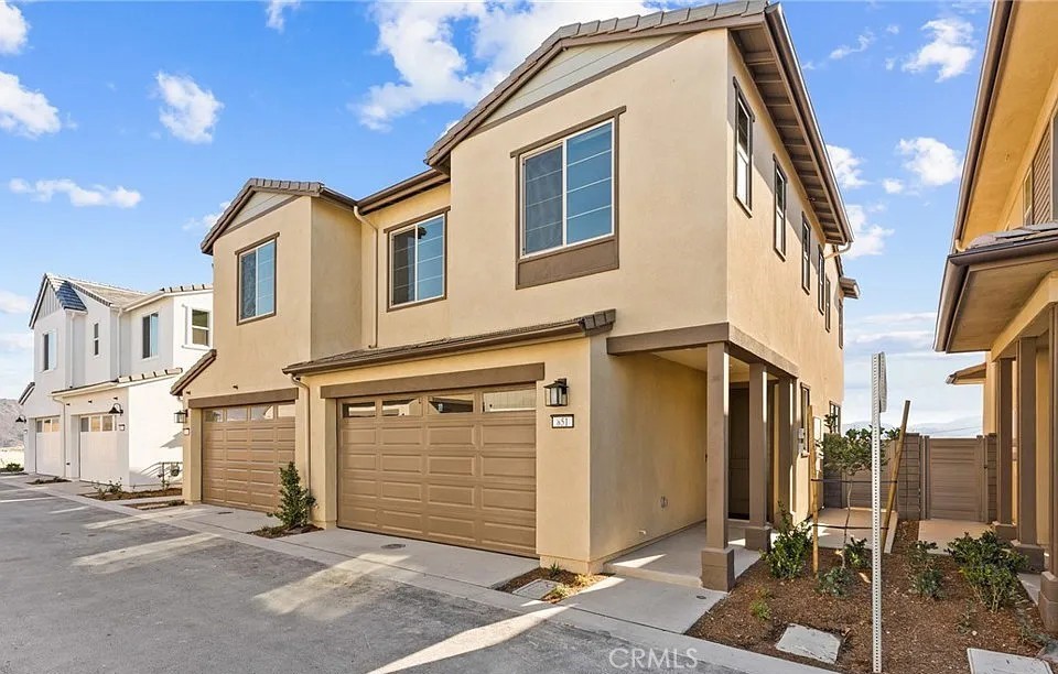 Location, Location, Location. Welcome to your new sanctuary in the heart of the Rienda Rancho Mission Viejo community! This home is located on top of the hill with a private backyard - facing south with views of mountains. This home features three bedrooms, two-and-a-half-bathrooms with modern finishes, and 40k+ upgrades that create a warm and inviting atmosphere. Open concept which is perfect for the family or entertaining. The first level includes highly upgraded kitchen with quartz countertops, stainless steel appliances including oversized sink. The dining area has sliding glass doors overlooking the patio & wrap around yard. Living room area is off kitchen island and is an excellent space for gatherings. A powder room is conveniently located on the first level. Wood-like laminate plank flooring through out the home except for carpeting in the bedrooms and recessed lighting The luxurious primary suite features a stunning view with a walk in closet. The primary bathroom offers the convenience of dual sinks, ensuring a delightful experience during your morning routine, to accommodate all your needs. Two more generous sized bedrooms are also featured in this home with a separate area for laundry. Includes paid off solar, offering a lower electric cost, double paned windows and energy efficient hot water heater. This home defines environmental living. Step outside to discover a world of community amenities, including a sparkling pool, playgrounds, and beautifully landscaped walking trails, all designed for an active and engaging lifestyle. Here, you’ll find the perfect blend of comfort, elegance, and community spirit, making it easy to call this beautiful house your home!.