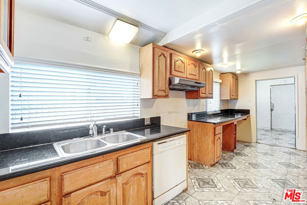 Photo of 1145 W 89th Street, Los Angeles, CA 90044 (MLS # 26662925)