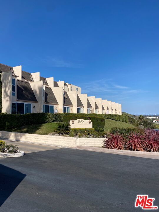 Bright, breezy, and beautifully positioned, this 3-bedroom townhome-style condo delivers stunning ocean views and a true Malibu lifestyle. there is a one bedroom downstairs with its own bathroom and two bedrooms upstairs. The two-level layout creates a nice sense of separation an open living and dining areas on the main floor. A private balcony offers the perfect spot to relax and take in the coastal scenery. Located in the coveted Malibu Canyon Village, residents enjoy resort-style amenities including a pool, tennis courts, fitness center. This unit has two covered parking spaces and guest parking. The community is guard gated with 24/7 onsite security for peace of mind. Just minutes from the beach, Pepperdine University, local shops and dining. This property is an excellent option for a full-time residence, second home, or investment. It is a unique opportunity to own and enjoy the Malibu life.