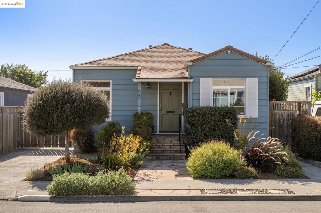 Beautiful bungalow with detached studio dwelling. On one of the best blocks in Richmond N&E, 629 31st offers a warm and welcome space to call home. Out front is a professionally landscaped front garden with flagstone walkway and front porch, while through the front door is a light-filled living room seamlessly connected to the sunny dining room and updated kitchen. With quartz countertop, designer light fixtures, and stunning cedar floors, this home exudes quality at every turn. Set off the main living space is the updated bathroom and two spacious bedrooms overlooking the back garden - perfect spaces to unwind at the end of the day. Off the kitchen is the laundry room with direct access to the back garden, studio dwelling, and shed/office. The back garden is surrounded by mature landscaping, with raised garden beds and two decks for lounging. Offering even more space to spread out, the detached studio dwelling offers a large room with full bathroom and a newly updated kitchenette with stainless steel appliances, quartz countertop, and custom floating shelves. Ideally situated with access to countless neighborhood favorites such as the Solano Playlot + Burg Park, the Richmond Arts Center, Catahoula Coffee, the Factory Bar, and easy access for commuters to BART and Richmond Ferry.