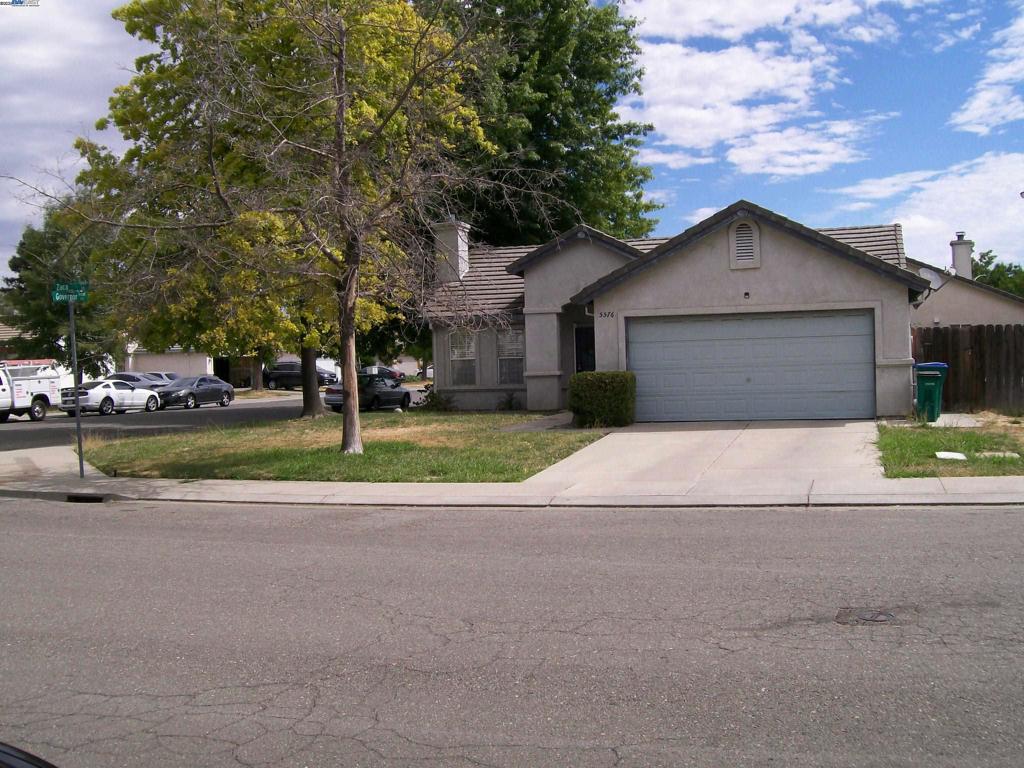 Beautiful 3 Bedrooms and 2 Baths Move in Ready.2 car Garage Corner Lot.Established Neighborhood with Lots of Upgrades Elegant Hardwood Flooring Throughout the entire House.UpDated Light Fixtures Living room,Gas Fireplace.and Vaulted Ceiling Granite Counter tops with Backsplash,Recessd Lights.Nice Stove and Refrigerator..Backyard with Concrete Patio, Shopping Centers very closed by. Park walking Distance.Less than 5 Minures to HWY 99 HWY 5 Just few Minutes away.Dishwasher,Garbage Disposal Large Deep Sink